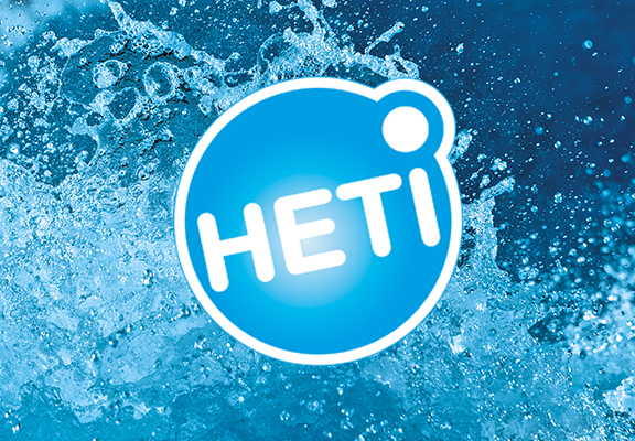 HETI-brändin logo fiiliskuvataustalla